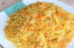Stewed cabbage recipe in a frying pan with tomatoes